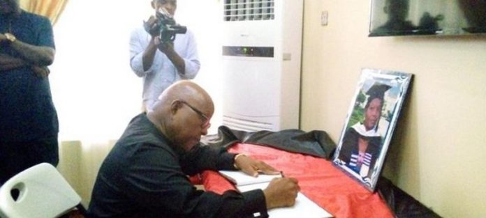 The Speaker, Reverend Professor Mike Oquaye signing the book of condolence