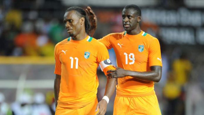 Toure (R) called Drogba his 