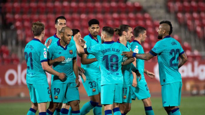 Barcelona´s Danish forward Martin Braithwaite (2L) celebrates with teammates after scoring a goal during the Spanish League football match between RCD Mallorca and FC Barcelona at the Visit Mallorca stadium (Son Moix stadium) in Palma de Mallorca on June Image credit: Getty Images