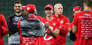 Robert Lewandowski of Bayern Munich wears a shirt and cap in celebration of securing the Bundesliga title following their victory in the Bundesliga match between SV Werder Bremen and FC Bayern Muenchen Image credit: Getty Images