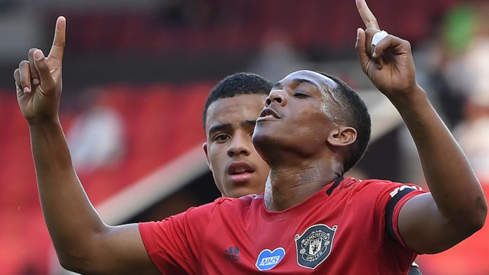 Manchester United's French striker Anthony Martial celebrates scoring his team's second goal against Sheffield United Image credit: Getty Images