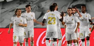 Real Madrid's Brazilian forward Vinicius Junior (R) celebtrates with teammates after scoring during the Spanish League football match Real Madrid CF against RCD Mallorca at at the Alfredo di Stefano stadium Image credit: Getty Images