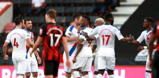 Jordan Ayew celebrates with his Palace teammates