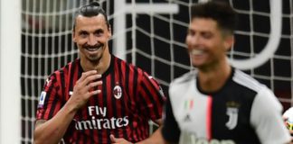 Zlatan Ibrahimovic celebrates scoring for AC Milan as Cristiano Ronaldo looks on. Image credit: Getty Images