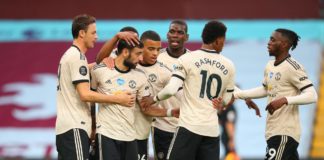 Bruno Fernandes of Manchester United celebrates with team mates after scoring the opening goal from a penalty kick during the Premier League match between Aston Villa and Manchester United at Villa Park Image credit: Getty Images