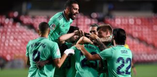 Real Madrid's players celebrate after French defender Ferland Mendy scored during the Spanish league football match Granada FC vs Real Madrid CF at Nuevo Los Carmenes stadium in Granada on July 13, 2020. Image credit: Getty Images