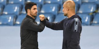 Mikel Arteta and Pep Guardiola bump elbows Image credit: Getty Images