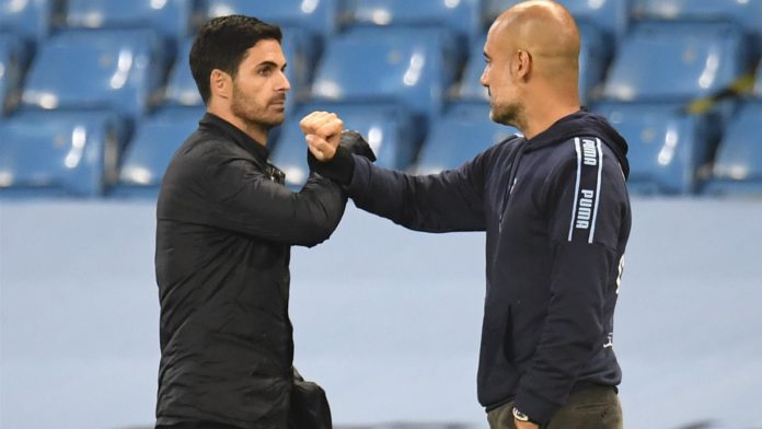 Mikel Arteta and Pep Guardiola bump elbows Image credit: Getty Images