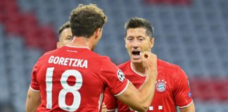 Bayern Munich's Polish forward Robert Lewandowski (R) celebrates with his teammate Bayern Munich's German midfielder Leon Goretzka after scoring his team's first goal during the UEFA Champions League, second-leg round of 16, football match FC Bayern Munic Image credit: Getty Images