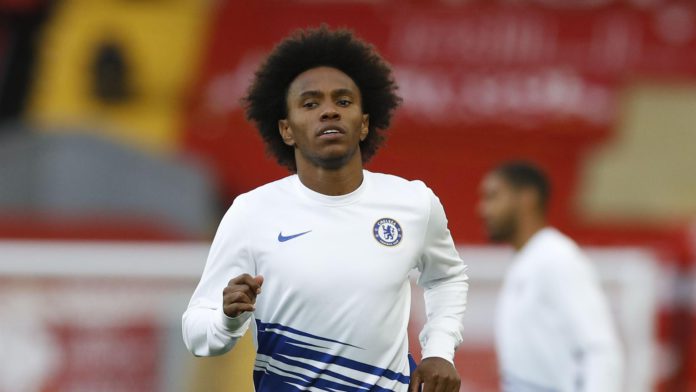 Willian of Chelsea warms up prior to during the Premier League match between Liverpool FC and Chelsea FC at Anfield on July 22, 2020 in Liverpool, England. Image credit: Getty Images