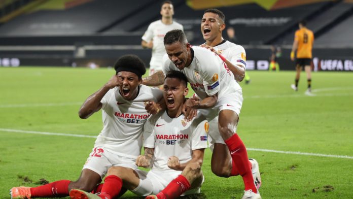 Sevilla's Argentinian midfielder Lucas Ocampos (C) celebrates scoring his team's first goal during the UEFA Europa League quarter-final football match Wolverhampton Wanderers v Sevilla at the MSV Arena on August 11, 2020 in Duisburg, western Germany. Image credit: Getty Images