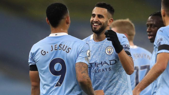 Riyad Mahrez celebrates scoring for Manchester City Image credit: Getty Images