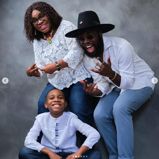 M.anifest and mother in family photo