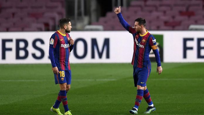 Lionel Messi of Barcelona celebrates after scoring their side's first goal as team mate Jordi Alba looks on during the La Liga Santander match between FC Barcelona and Athletic Club at Camp Nou Image credit: Getty Images