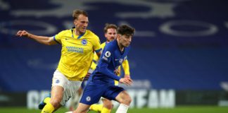 Kai Havertz of Chelsea runs with the ball under pressure from Dan Burn of Brighton and Hove Albion during the Premier League match between Chelsea and Brighton & Hove Albion at Stamford Bridge on April 20, 2021 in London, England Image credit: Getty Images