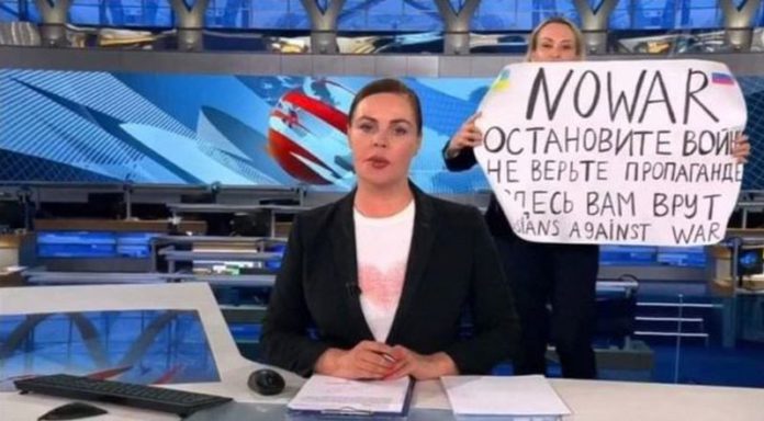 It comes after news editor Marina Ovsyannikova held up an anti-war message during a live broadcast last night ( Image: AFP via Getty Images)