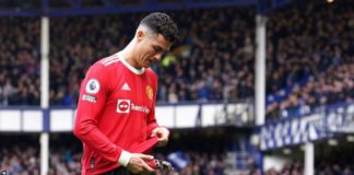 Ronaldo appeared to knock a young fan's phone to the ground as he walked down the tunnel at Goodison