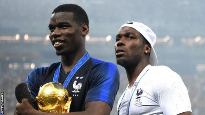 Mathias Pogba, right, joined brother Paul on the pitch to celebrate France's 2018 World Cup win