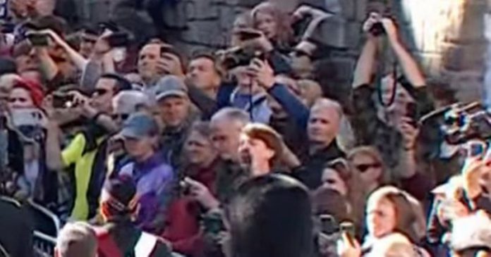 Protester hurls abuse at Queen Elizabeth II procession ( Image: @chrismarshll/Twitter)