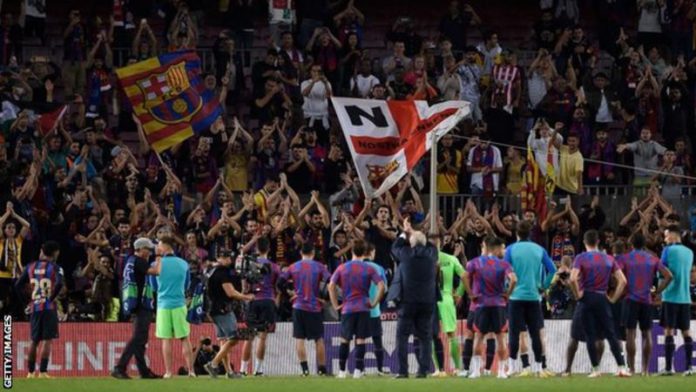 Some Barcelona fans stayed behind after the match to applaud their team