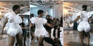 Nigerian bride stuns in a white dress while showing off dance moves. source: @maxwelljennings