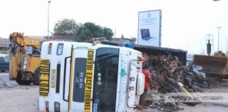 The truck as it lay on its side in the middle of the road