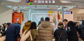 People buy tickets at the China Sports Lottery counter in Shanghai, China (Image: Future Publishing via Getty Images)