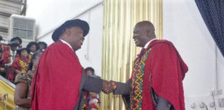 Prof. Robert Darko Osei (left), Dean, School of Graduate Studies, University of Ghana, congratulating Dr Bryan Acheampong, former Minister of State for National Security and Agric Minister designate, during the graduation ceremony. Picture: Maxwell Ocloo