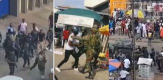 Armed police officers and soldiers clash