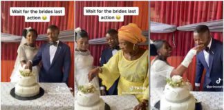 The husband was fed the cake by his bride. Photo source: @princewisdom544