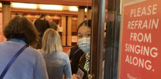 Signs at Manchester's Palace theatre ask audience members not to sing along during The Bodyguard