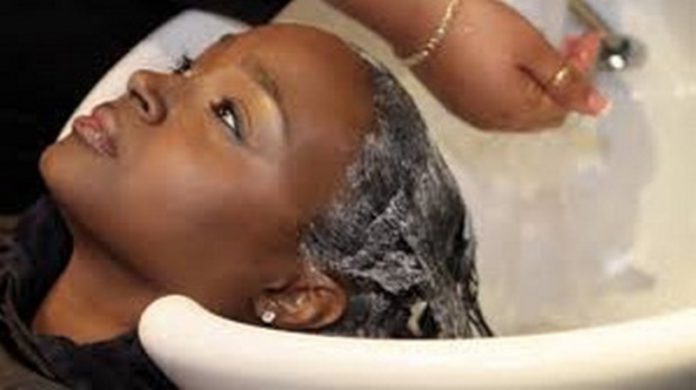 Using warm water to wash the hair opens the pores to rid the hair of dirt