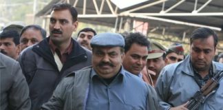 Atiq Ahmed, seen here outside a Delhi court in 2008, was one of India's most dreaded gangster-politicians