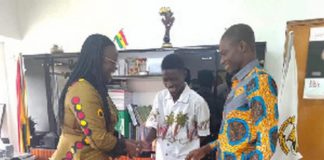 Darko Benjamin meets KNUST VC (left) with another official