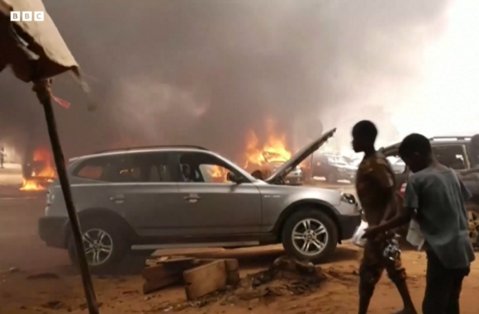 Ousted president's party HQ set ablaze in Niger | credit: BBC