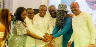 Kwesi Pratt Jnr (fourth left) cuts his 70th birthday cake with wellwishers