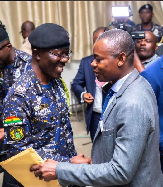 IGP Dampare's exchanges with Superintendent Gyebi. Credit : IGP photographer