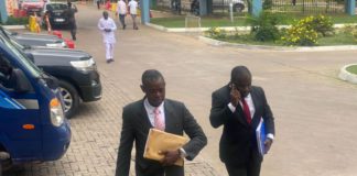 One of the witnesses, Sup. Eric Gyebi arrives with his lawyer.
