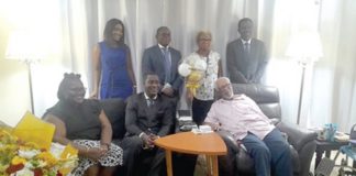 Ramses Cleland (seated middle) with other members of the delegation from the Ministry of Foreign Affairs during the celebration of the 100th birthday of Ambassador Richard Akwei (right)