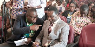 Eric Angel Carbonu (left), President, National Association of Graduate Teachers, conferring with Dr Yaw Osei Adutwum (right), Minister of Education, at the launch. Picture: EDNA SALVO-KOTEY