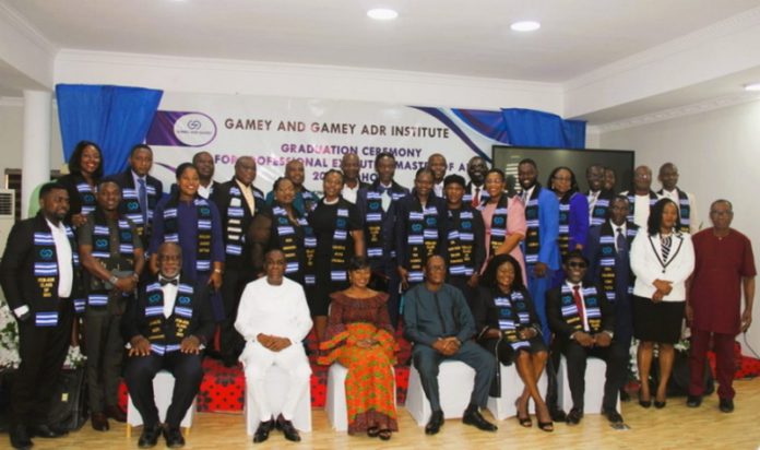 Justice Jennifer Abena Dadzie (third left), Mr Gamey (second left), and Dr Seddoh ( third right) with the graduating students