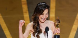 Michelle Yeoh accepts the award for Actress in a Leading Role at the 95th Academy Awards in the Dolby Theatre.(Myung J. Chun/Los Angeles Times)