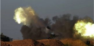 Israeli artillery units fire at an undisclosed target in the Gaza Strip on 7 May 2024.