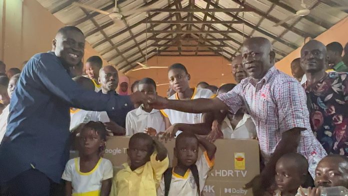 Joyce Bawa donates 55 inches Smart TV to Akuse RC Basic School;
