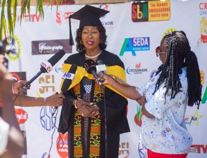 Mrs Gladys Desbordes-Hill being interviewed after her graduation