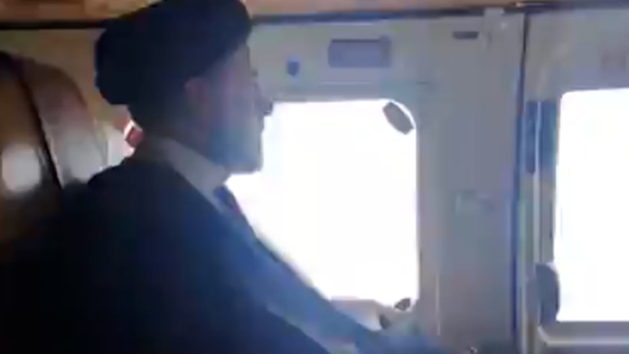 A screen grab from an IRIB via Tasnim News video shows Iranian President Ebrahim Raisi on a helicopter in Iran on May 19. IRIB via Tasnim News