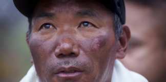 FILE- In this file photo taken on May 25, 2023, veteran Sherpa guide Kami Rita is seen arriving at the airport in Kathmandu, Nepal after scaling Mount Everest for the 28th time. Kami Rita scaled Mount Everest for a record 30th time on Wednesday, May 22, 2024, completing his second climb this month to the top of the world. (AP Photo/Niranjan Shrestha, File)