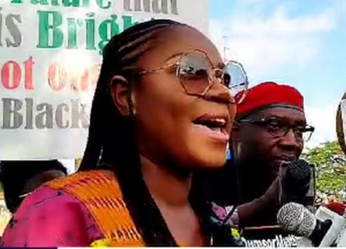 Yvonne Nelson speaking at Dumsor vigil