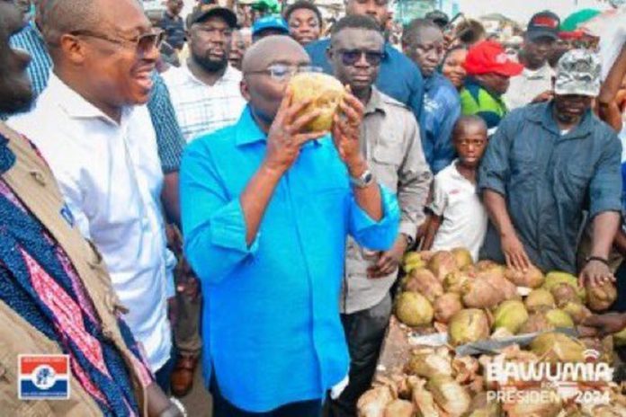 Dr Bawumia drinking coconut water