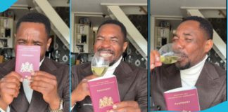 Kofi Gabs flaunting his passport. Photo Source: kofigabs